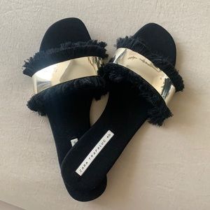 Zara Trafaluc Black and Mirror Gold fringe slip on